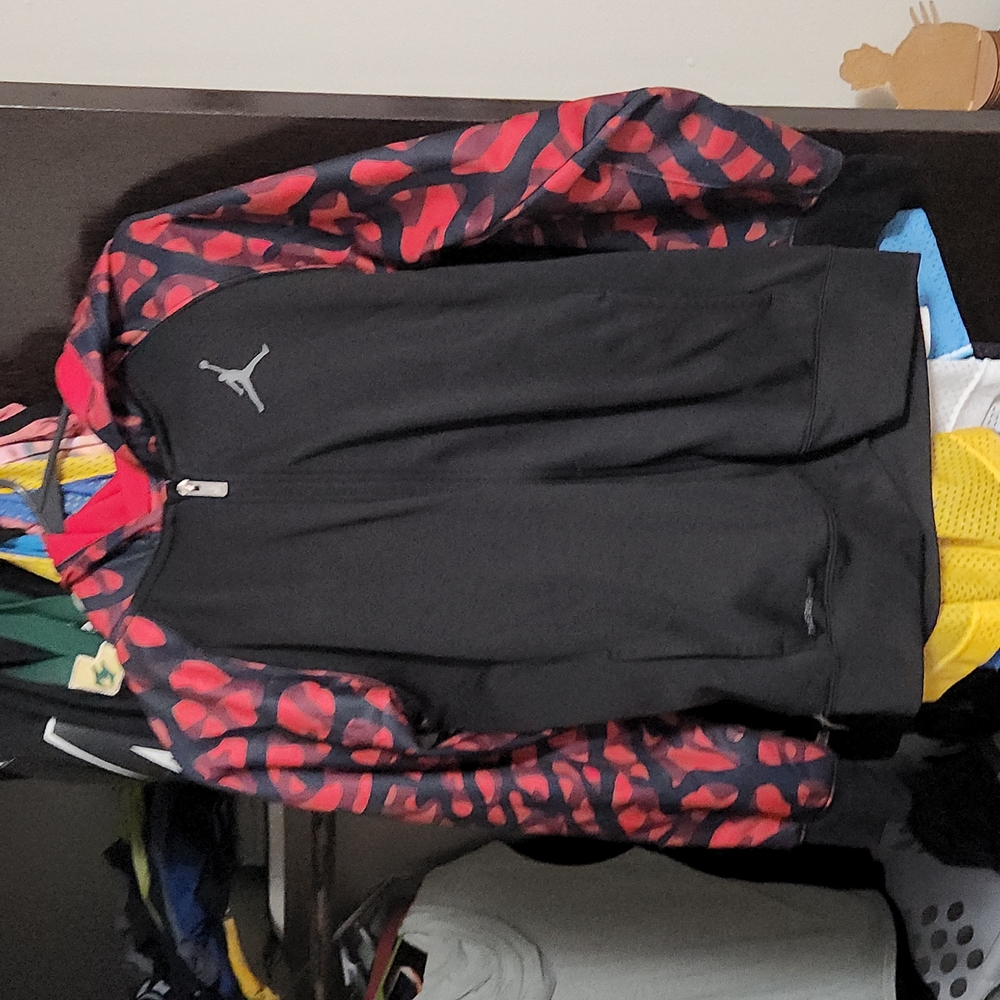 Red and black Jordan zip up, youth large